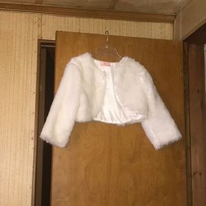 a puffy white pullover